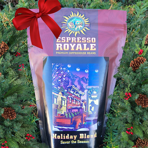 Holiday Blend bag on greenery.